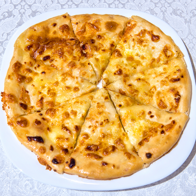 Пенерли на сливочном масле с яйцом и брынзой